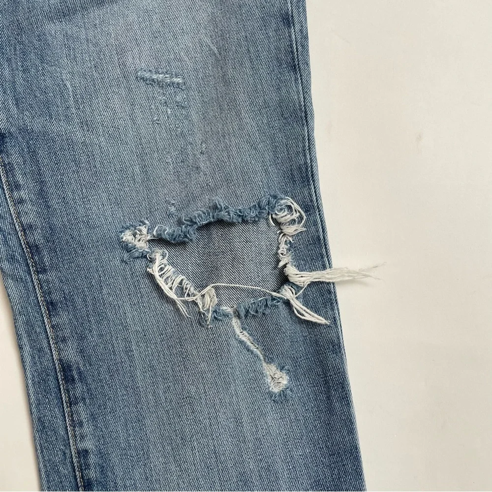 LEVI’S 511 distressed jeans